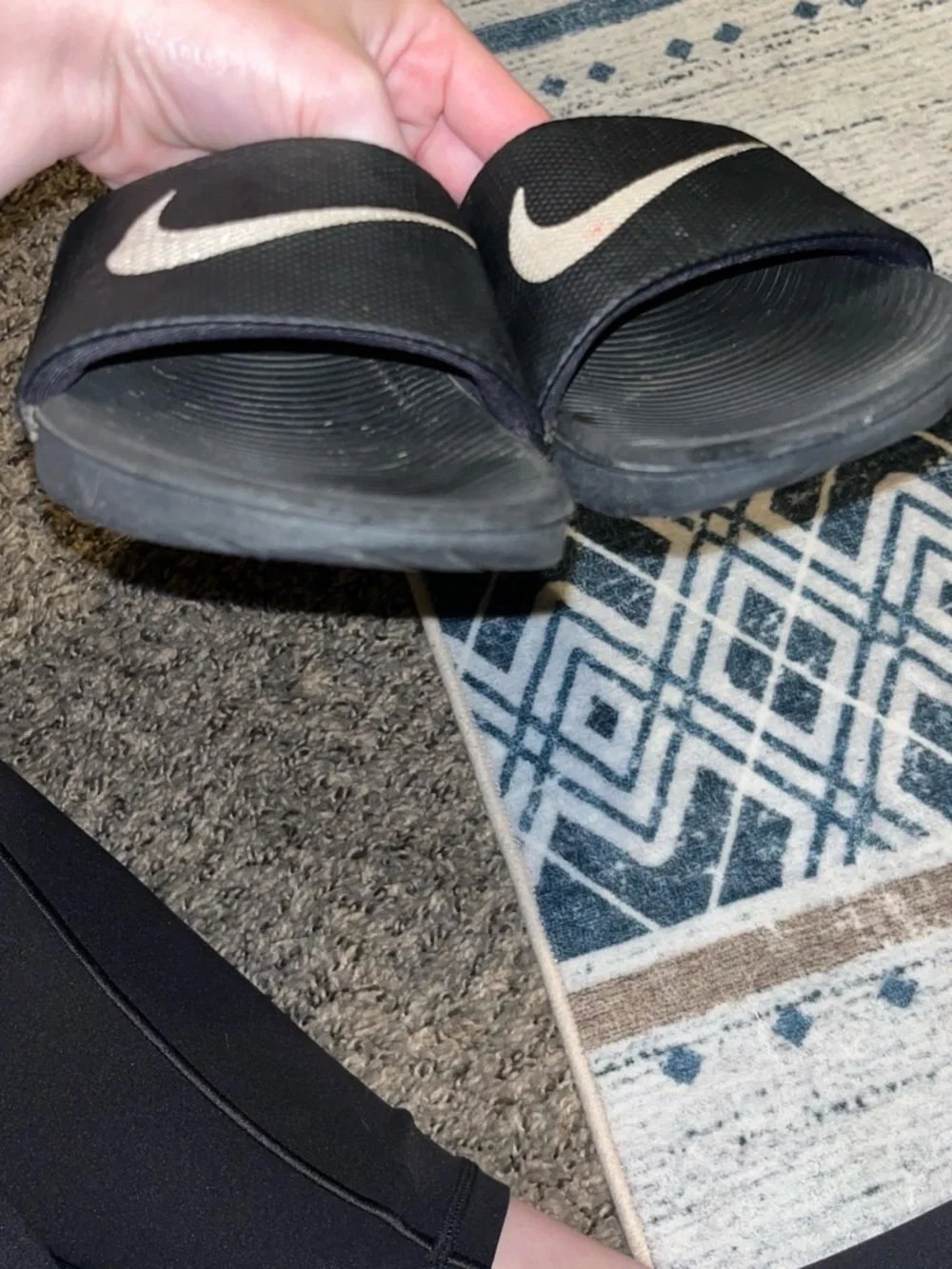Nike Kids Black Slide Sandals with White Swoosh Accent
